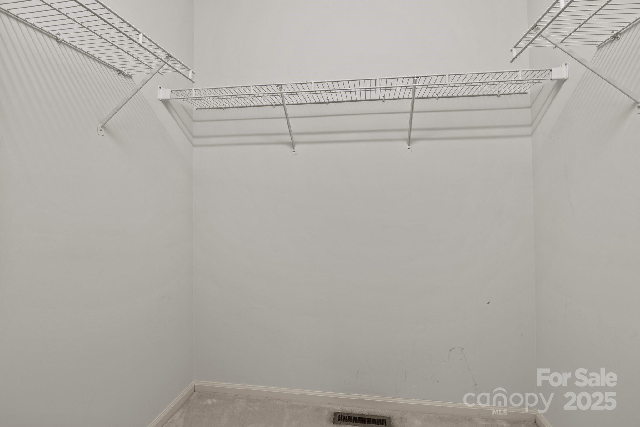 8368 Fairfield Forest Road Denver, NC 28037 - Photo 35 of 48 a view of a room with racks on the wall
