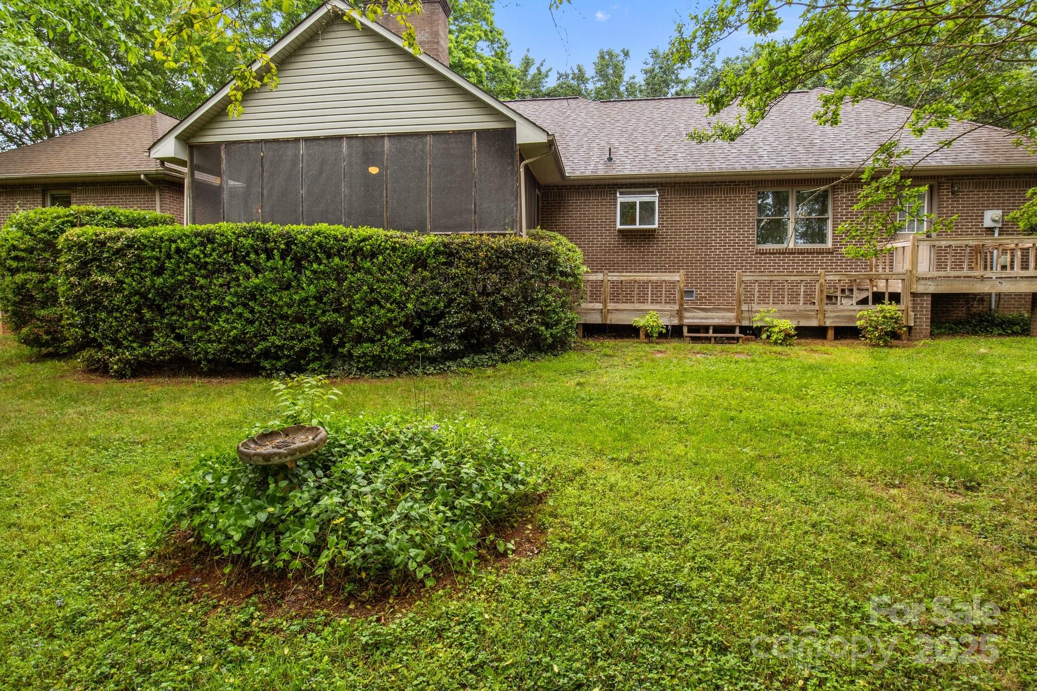 8368 Fairfield Forest Road Denver, NC 28037 - Photo 41 of 48 a view of a house with a garden and yard