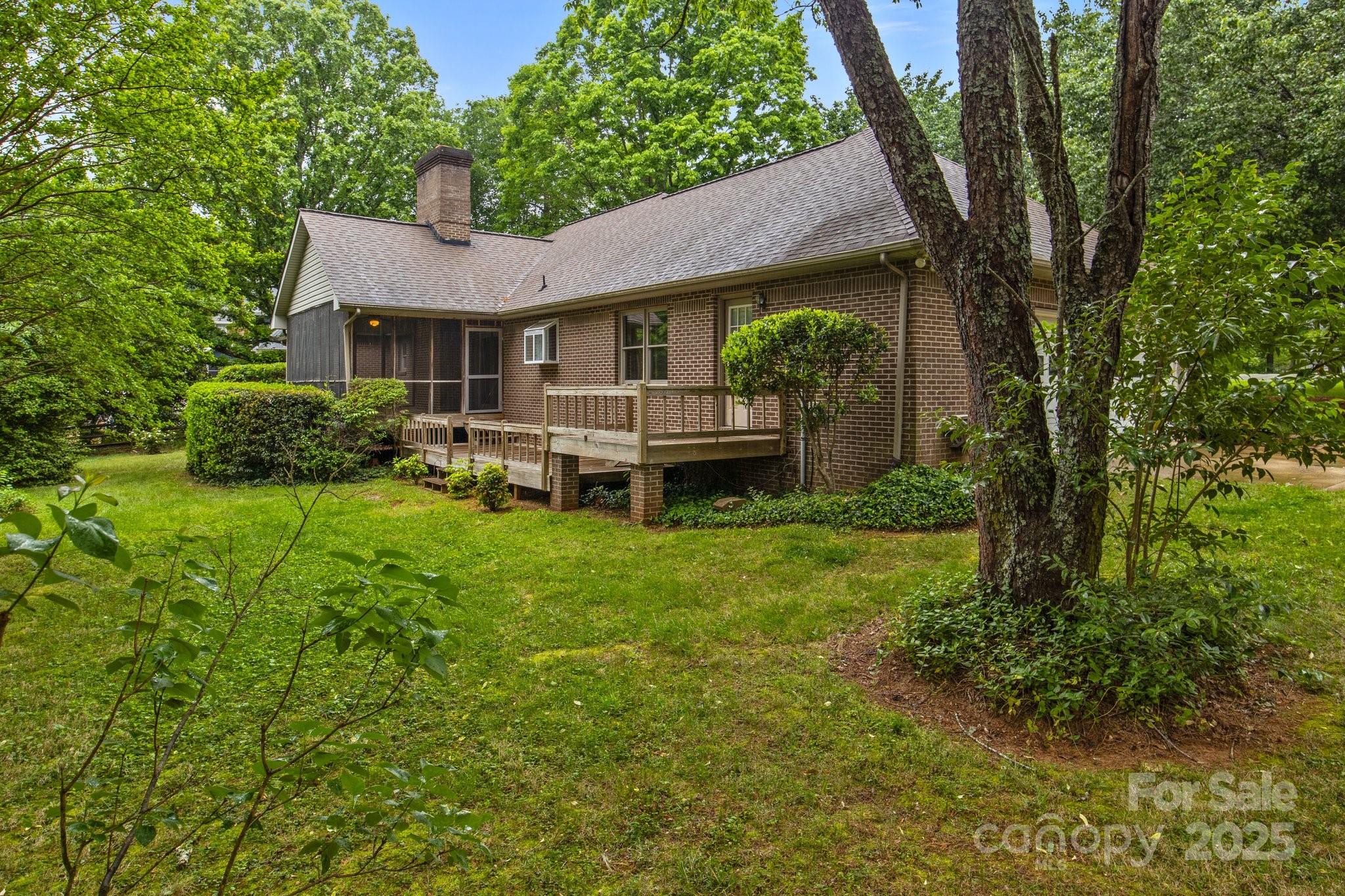 8368 Fairfield Forest Road Denver, NC 28037 - Photo 6 of 48 a front view of a house with garden