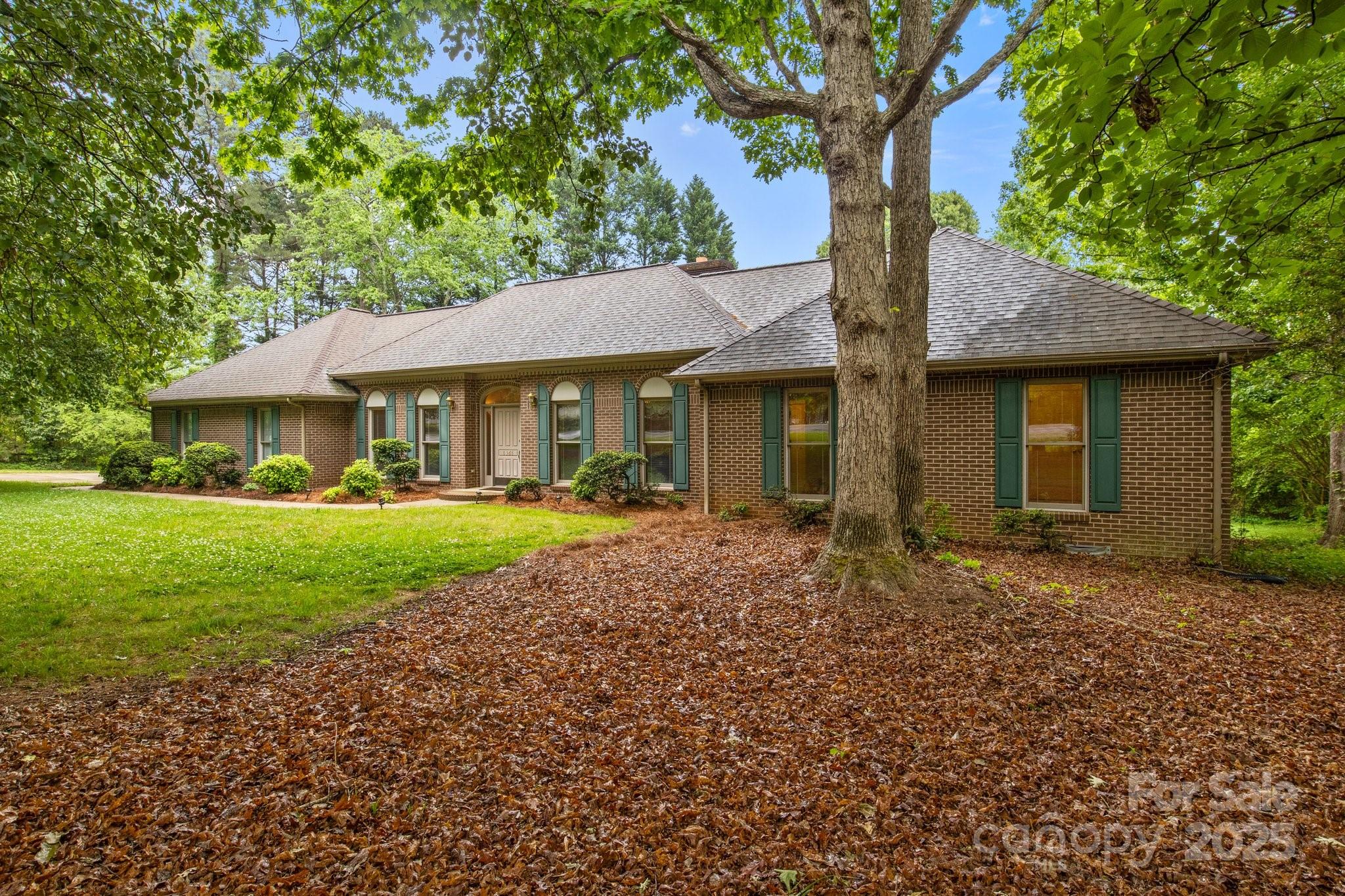 8368 Fairfield Forest Road Denver, NC 28037 - Photo 7 of 48 a front view of a house with garden