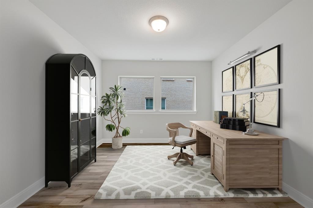 8916 Chestnut Lane Justin, TX 76247 - Photo 7 of 17 a view of a workspace with furniture and a window