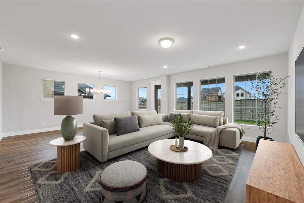 8916 Chestnut Lane Justin, TX 76247 - Photo 8 of 17 a living room with furniture and a large window