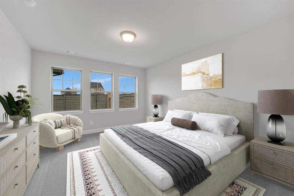 8916 Chestnut Lane Justin, TX 76247 - Photo 9 of 17 a bedroom with a bed and window