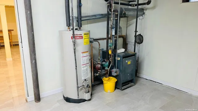 a view of storage and utility room with a sink