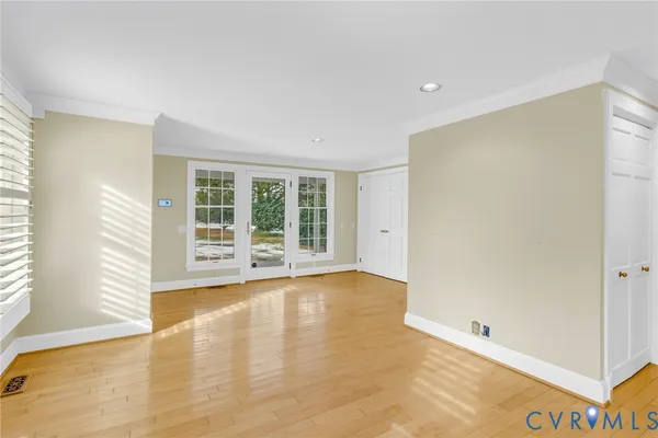 a view of kitchen and wooden floor