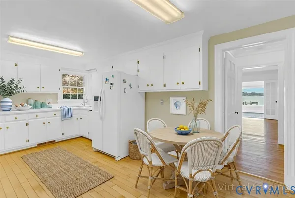 a bedroom with a bed and cabinets