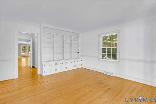a view of a living room and dining room