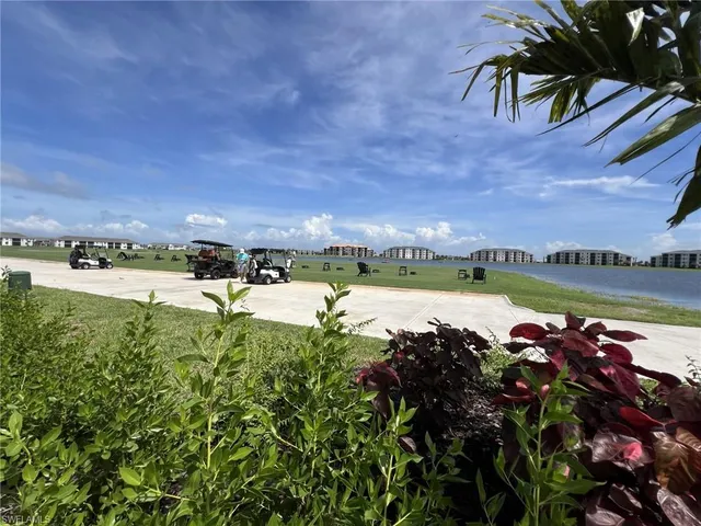 a view of a studio with wooden floor