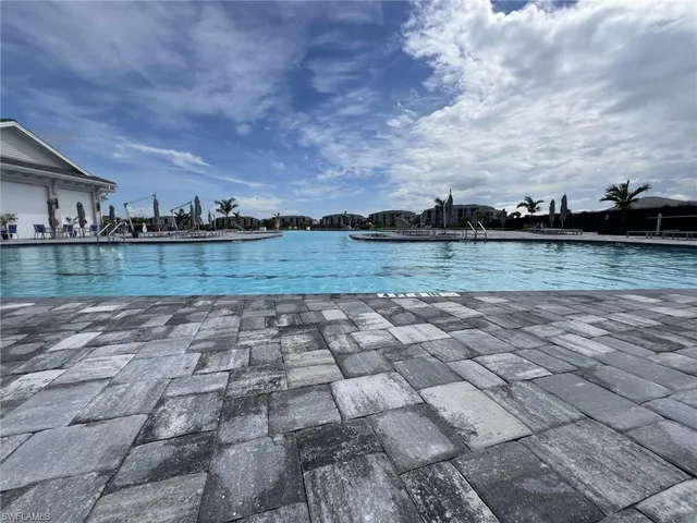 a tennis court with view of city