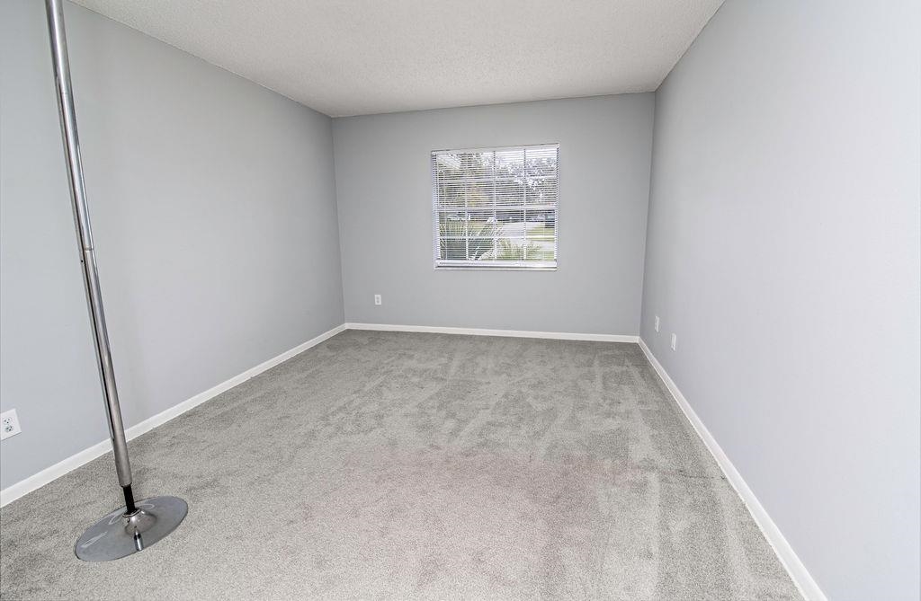 1061 Mindello Avenue St. Augustine, FL 32086 - Photo 13 of 26 an empty room with windows