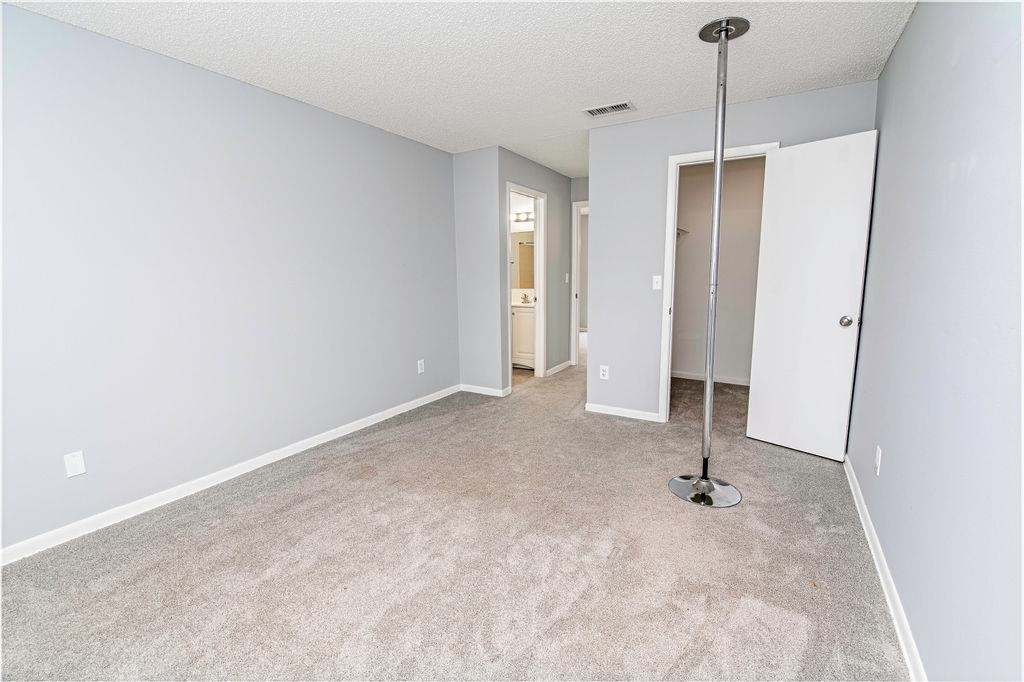 1061 Mindello Avenue St. Augustine, FL 32086 - Photo 15 of 26 a view of an empty room with a fireplace