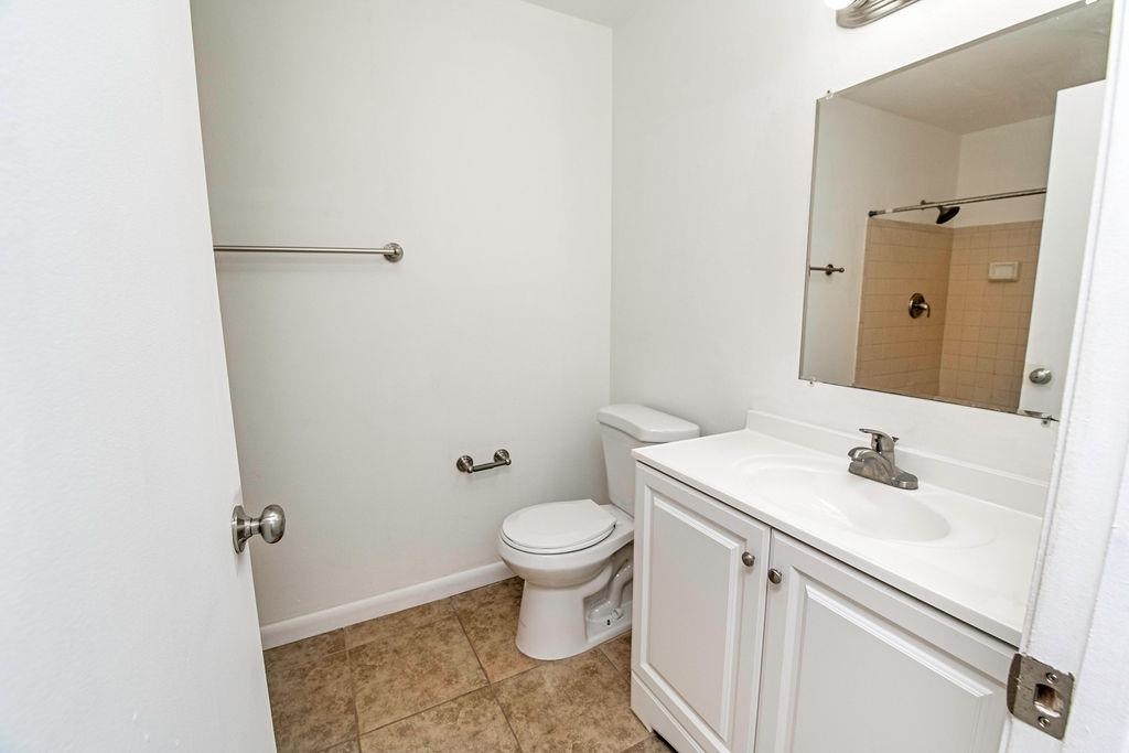 1061 Mindello Avenue St. Augustine, FL 32086 - Photo 16 of 26 a bathroom with a sink and a toilet