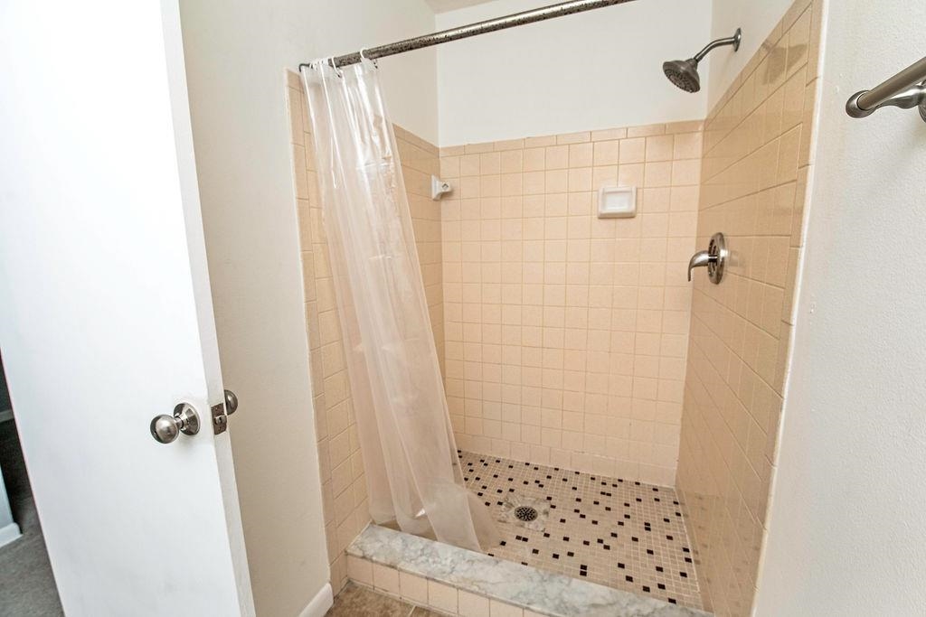 1061 Mindello Avenue St. Augustine, FL 32086 - Photo 17 of 26 a bathroom with a shower