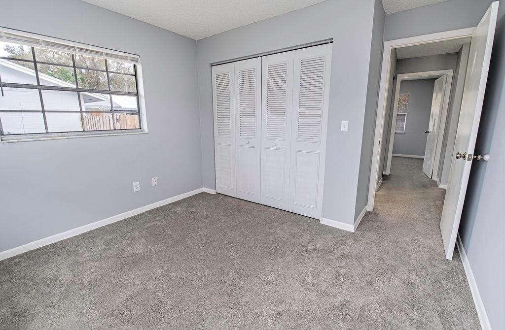 1061 Mindello Avenue St. Augustine, FL 32086 - Photo 20 of 26 an empty room with windows