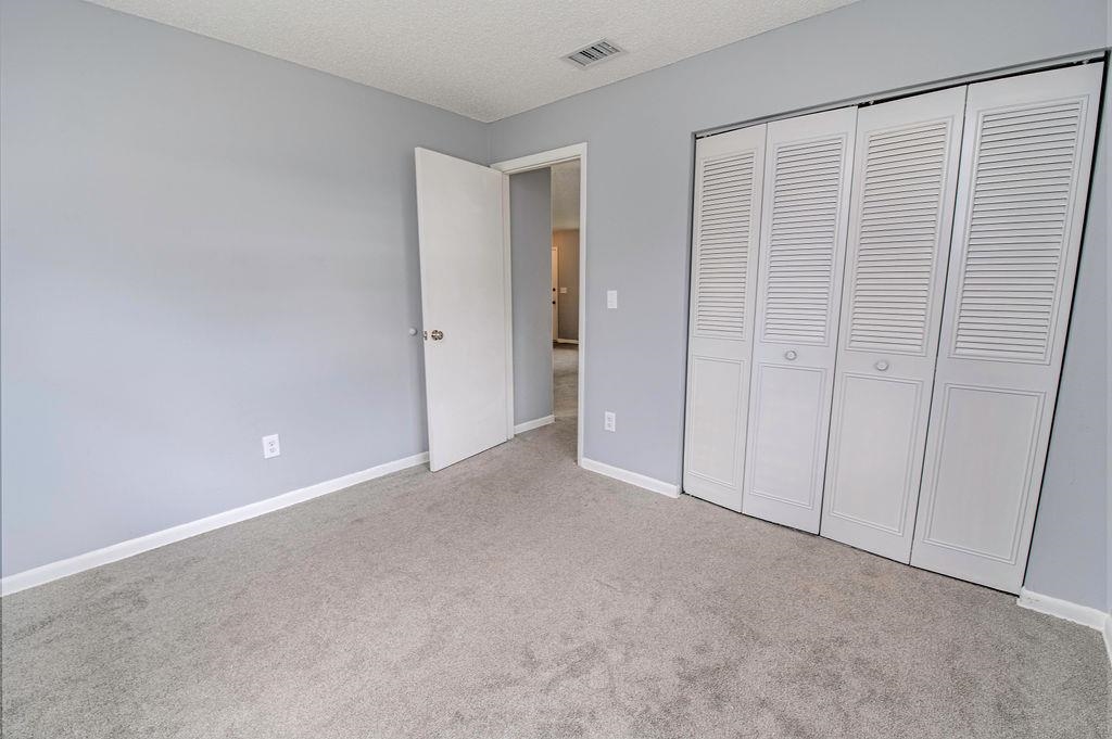 1061 Mindello Avenue St. Augustine, FL 32086 - Photo 23 of 26 a view of an empty room with closet area