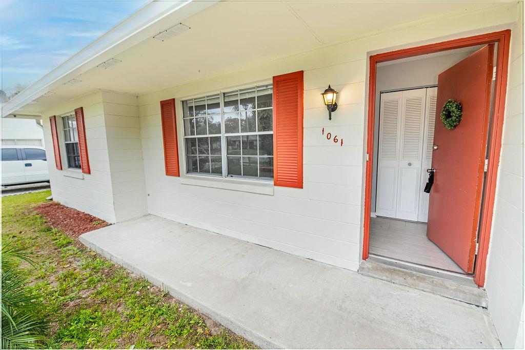 1061 Mindello Avenue St. Augustine, FL 32086 - Photo 6 of 26 an empty room with windows