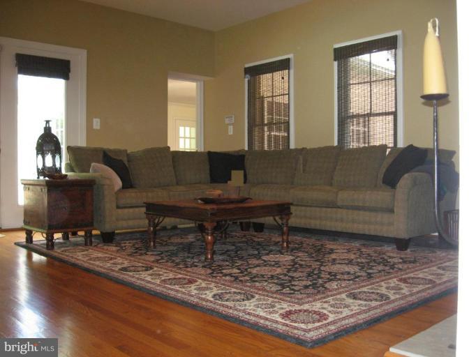 1694 Beulah Road Vienna, VA 22182 - Photo 10 of 30 Great Room Off Kitchen With Doors to Deck