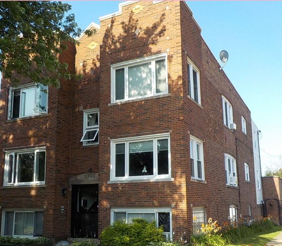 a front view of a multi story building