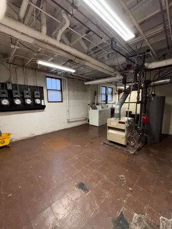 a view of parking garage with lots of white furniture