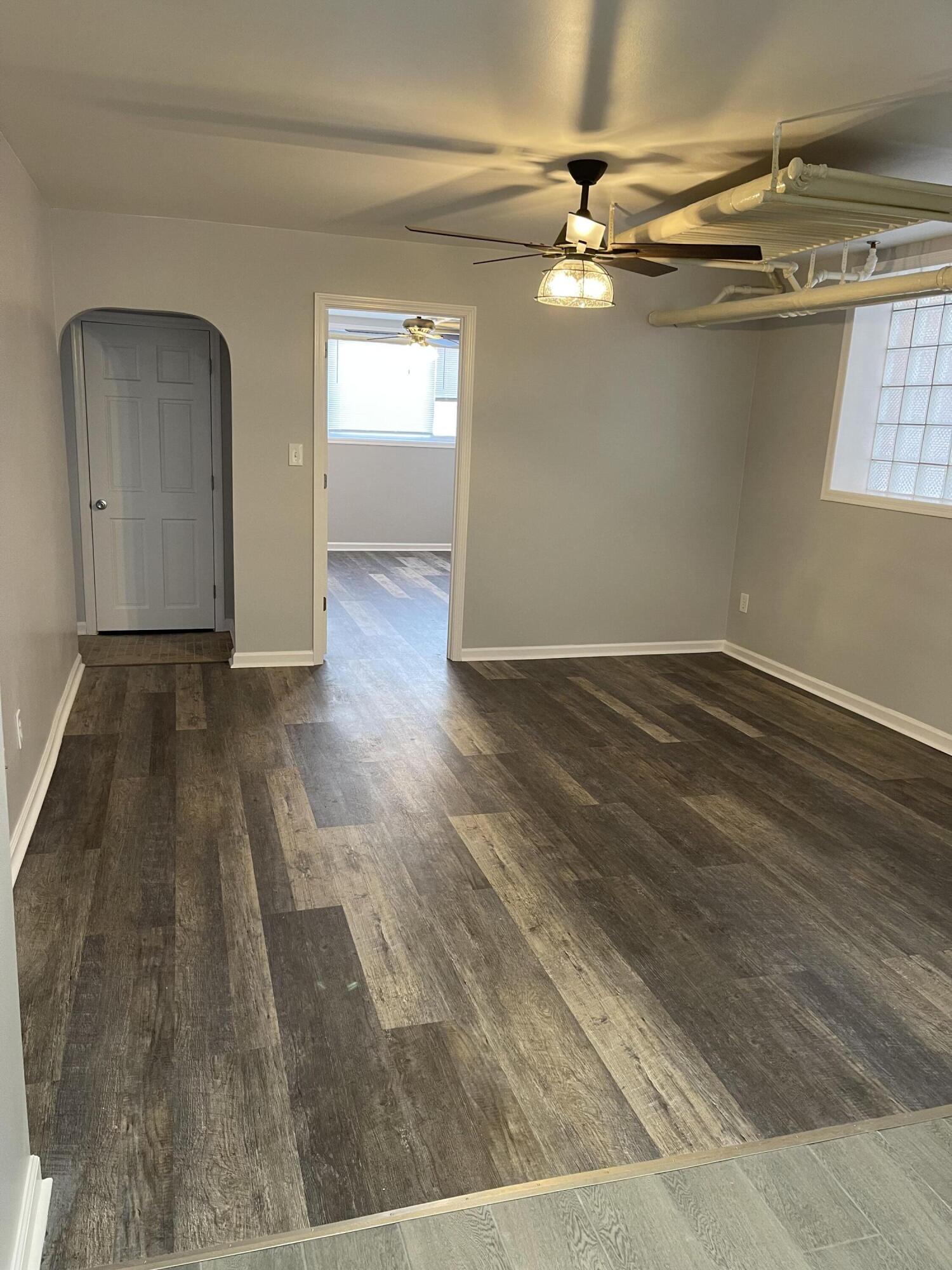 1820 Davis Avenue Whiting, IN 46394 - Photo 8 of 27 wooden floor in a hall with an entryway