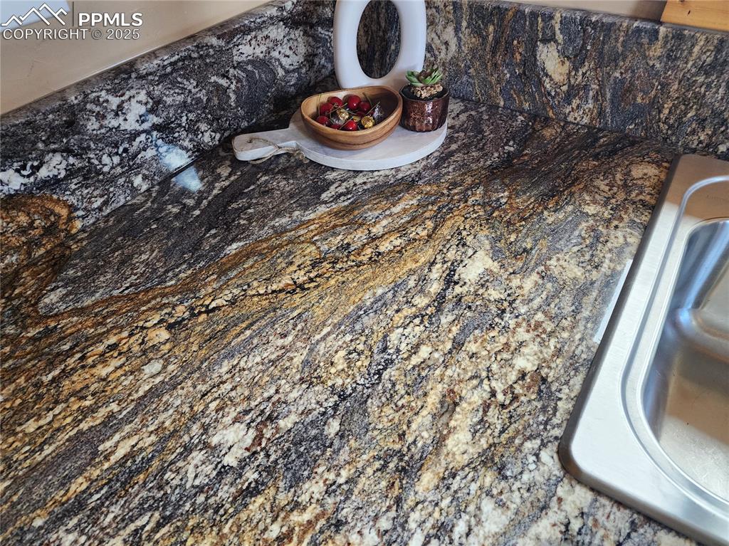 1226 E Path Cotopaxi, CO 81223 - Photo 14 of 49 Close up of the incredible color and texture of the new granite countertop