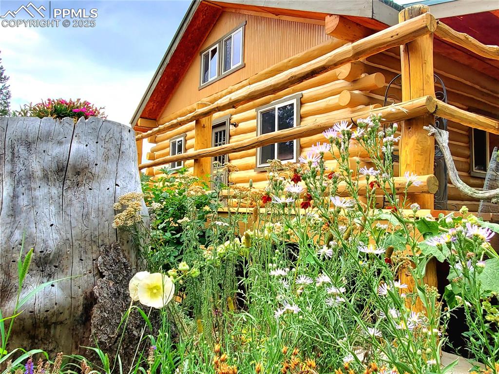 1226 E Path Cotopaxi, CO 81223 - Photo 44 of 49 Front of structure facing out to the garden coutryard with pernennials planted and coming back again