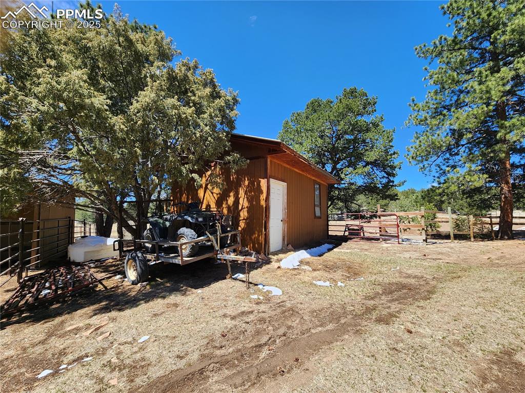 1226 E Path Cotopaxi, CO 81223 - Photo 46 of 49 Front of structure facing out to the garden coutryard with pernennials planted and coming back again