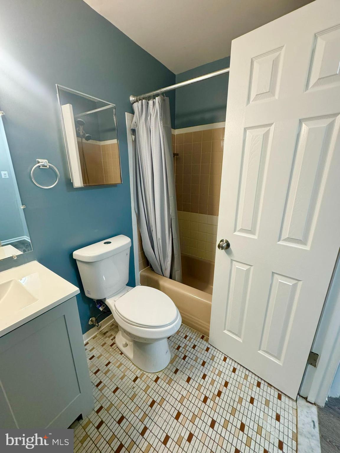 218 Locust Street Southeast, Unit 143 Vienna, VA 22180 - Photo 12 of 14 a bathroom with a toilet and a shower