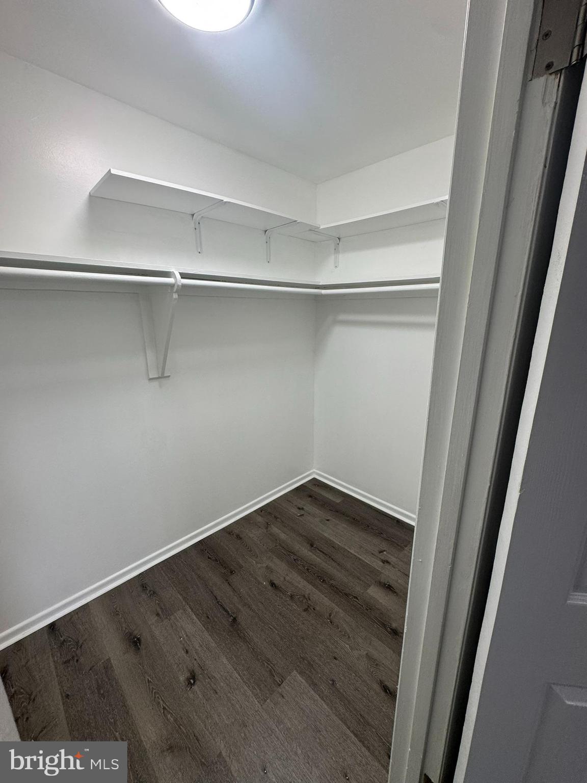 218 Locust Street Southeast, Unit 143 Vienna, VA 22180 - Photo 10 of 14 a view of an empty walk in closet