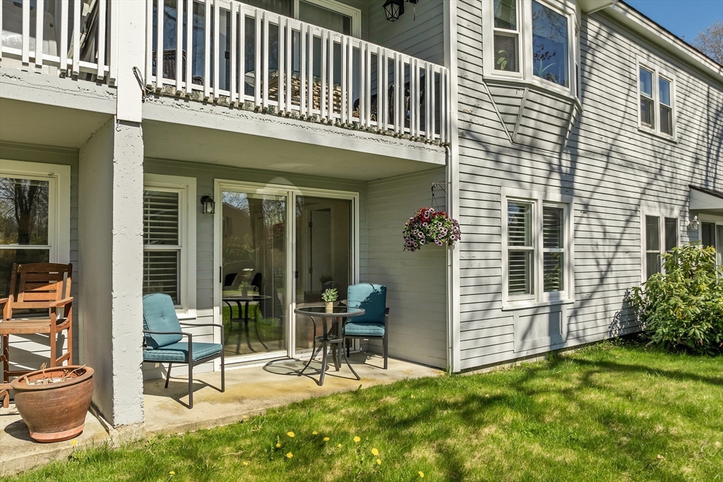 64 Esker Road, Unit 2 Hampton, NH 03842 - Photo 19 of 35 a view of a house with backyard and porch
