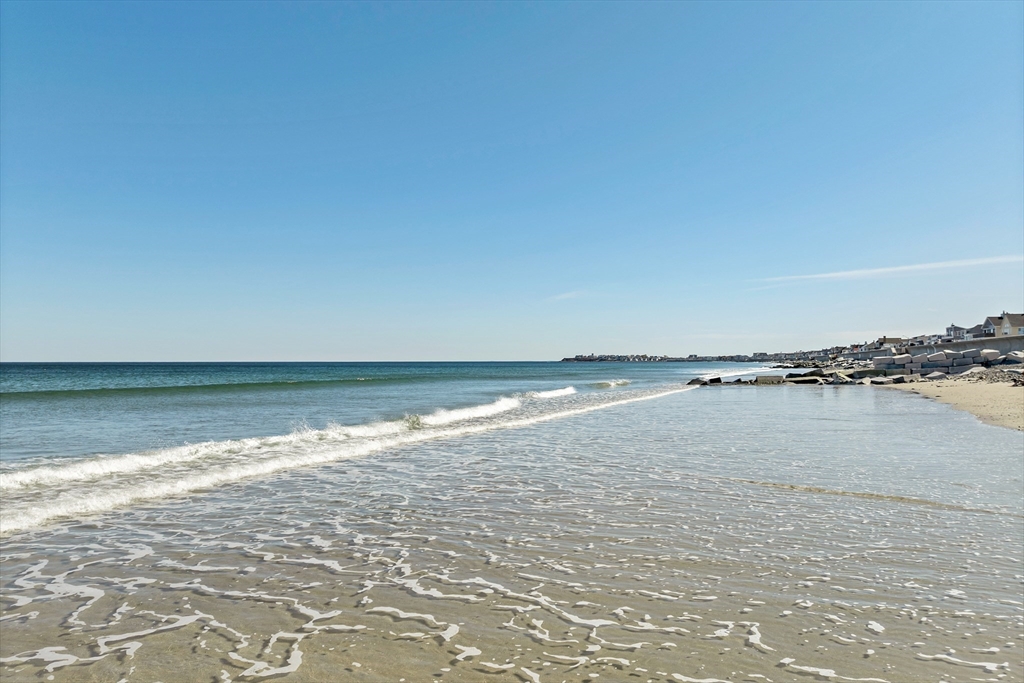 64 Esker Road, Unit 2 Hampton, NH 03842 - Photo 34 of 35 a view of an ocean and beach