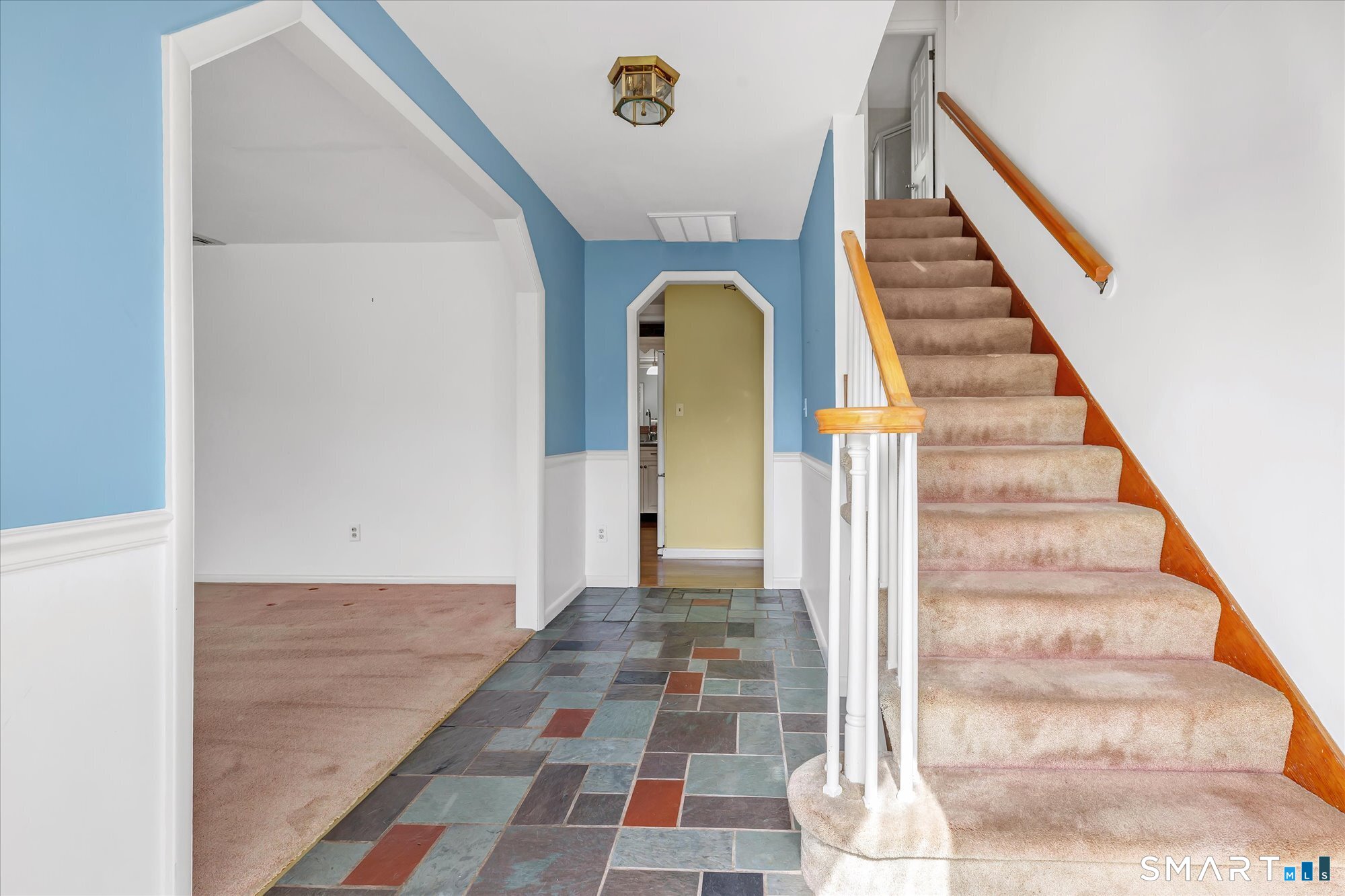 94 Ascolese Road Trumbull, CT 06611 - Photo 8 of 34 Tiled foyer entry, stairs to upper level