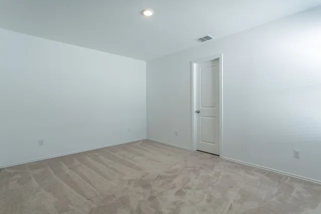 an empty room with an entryway