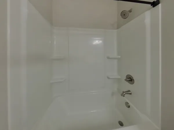 a close up of a bathtub
