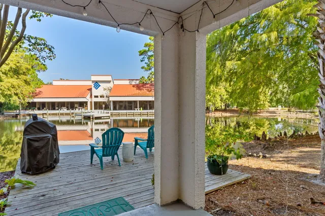 a view of a chairs and table in the patio