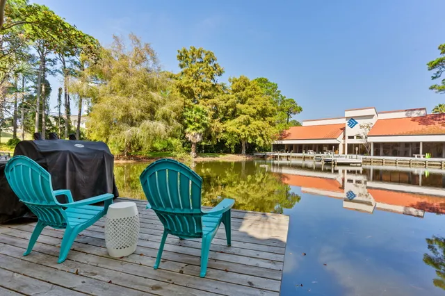 a view of a swimming pool with lounge chair