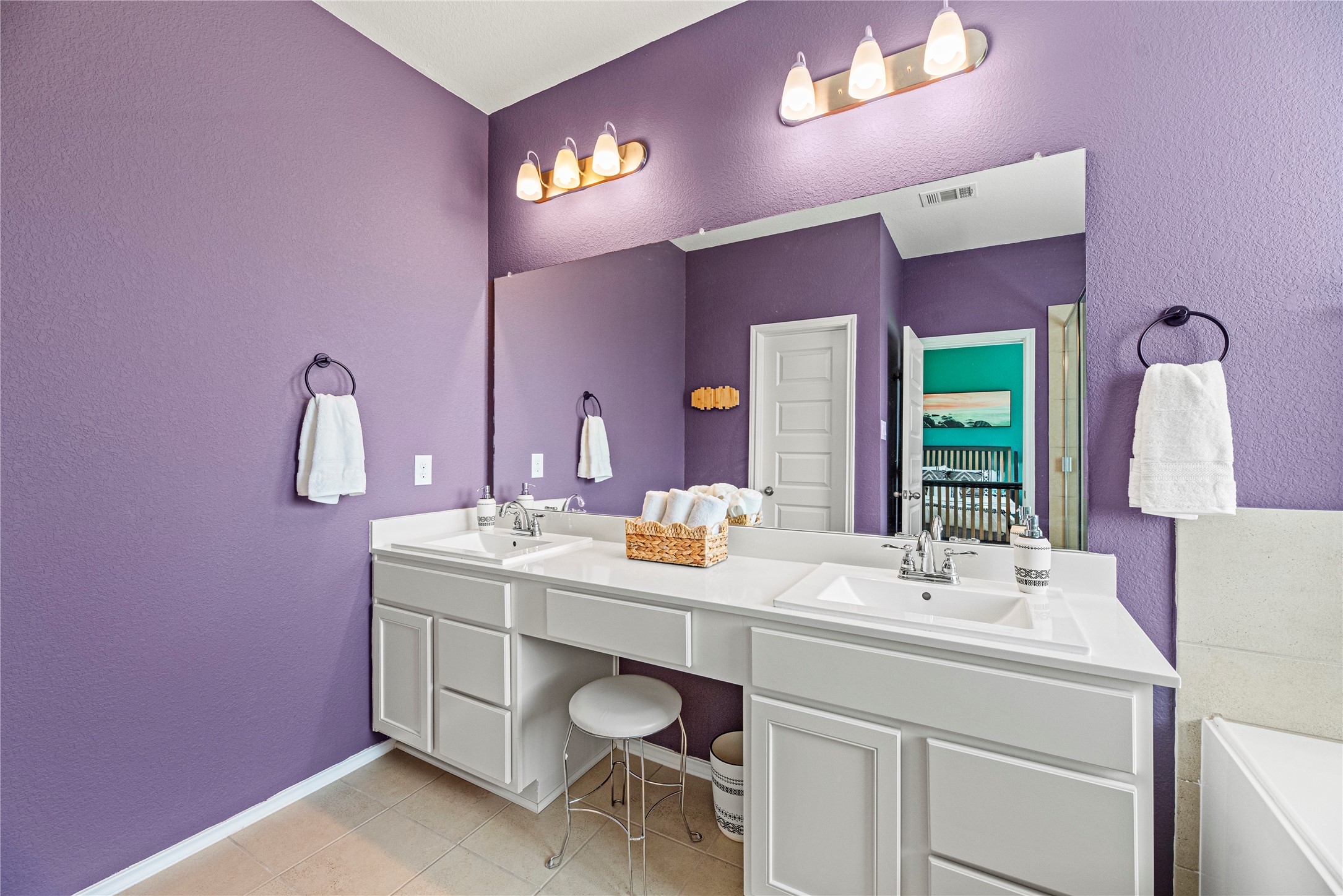 32963 Ruthie Dean Drive Fulshear, TX 77423 - Photo 15 of 45 a bathroom with a sink and a mirror