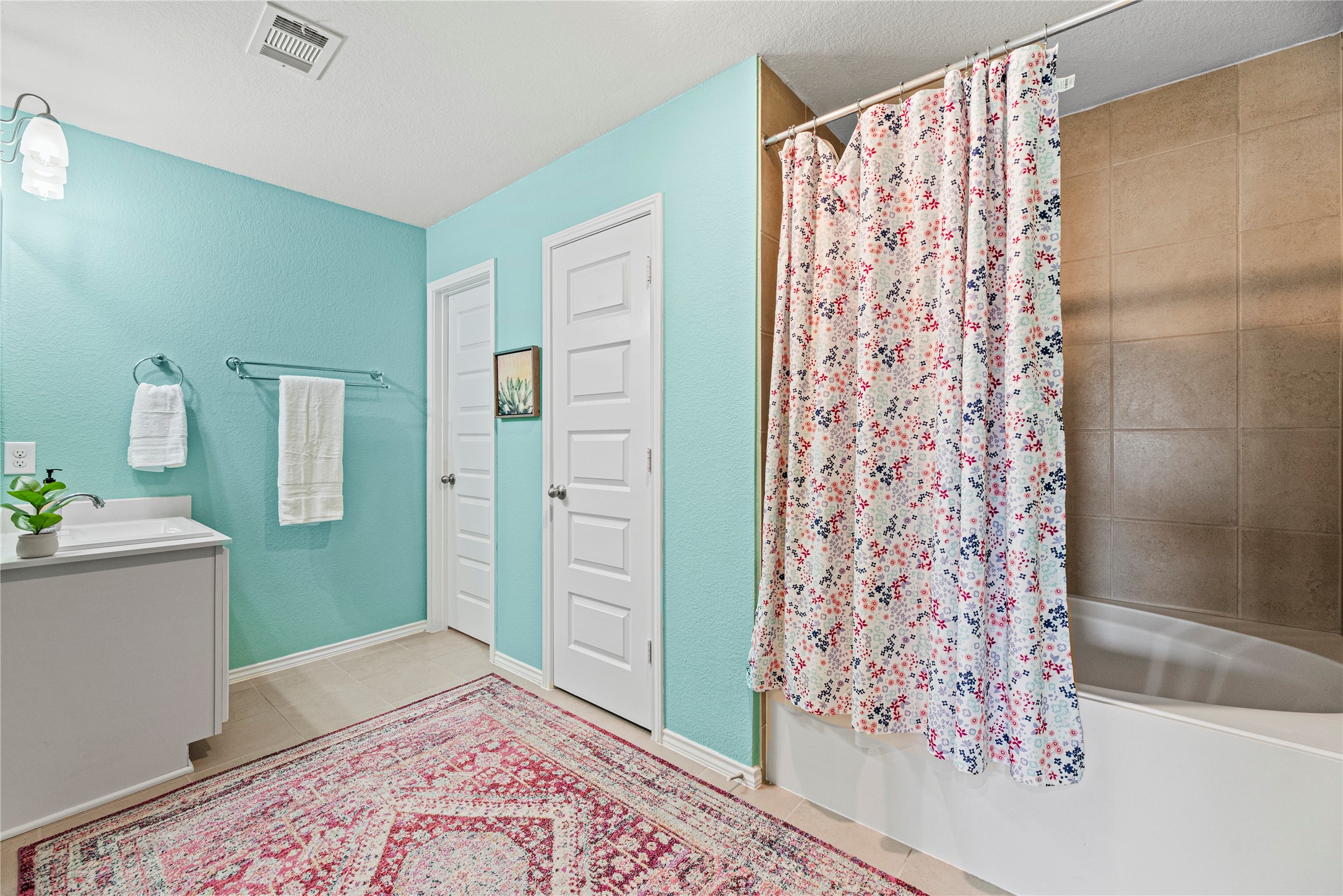 32963 Ruthie Dean Drive Fulshear, TX 77423 - Photo 24 of 45 a bedroom with a bed and a dresser