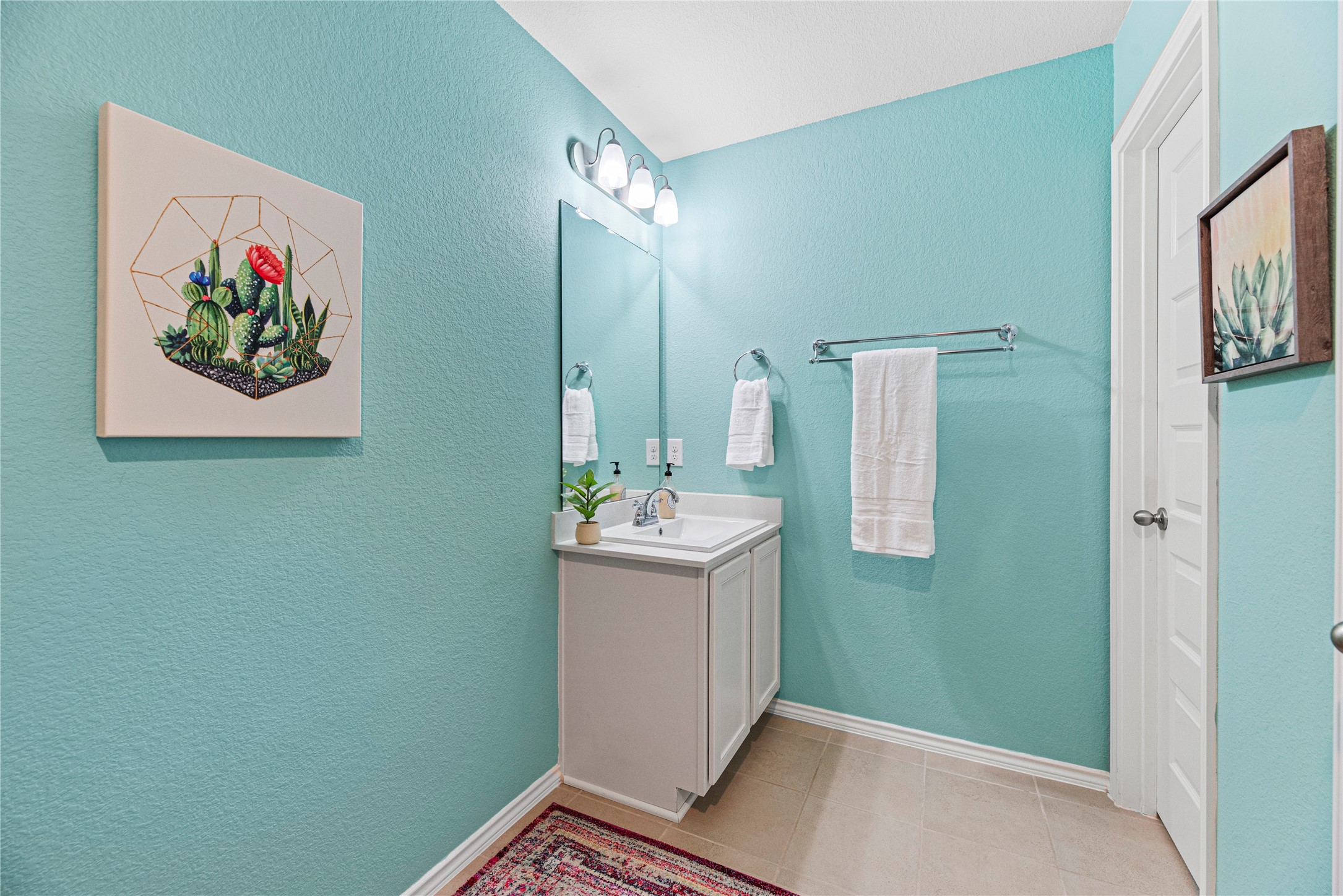 32963 Ruthie Dean Drive Fulshear, TX 77423 - Photo 25 of 45 a bathroom with a sink and a mirror