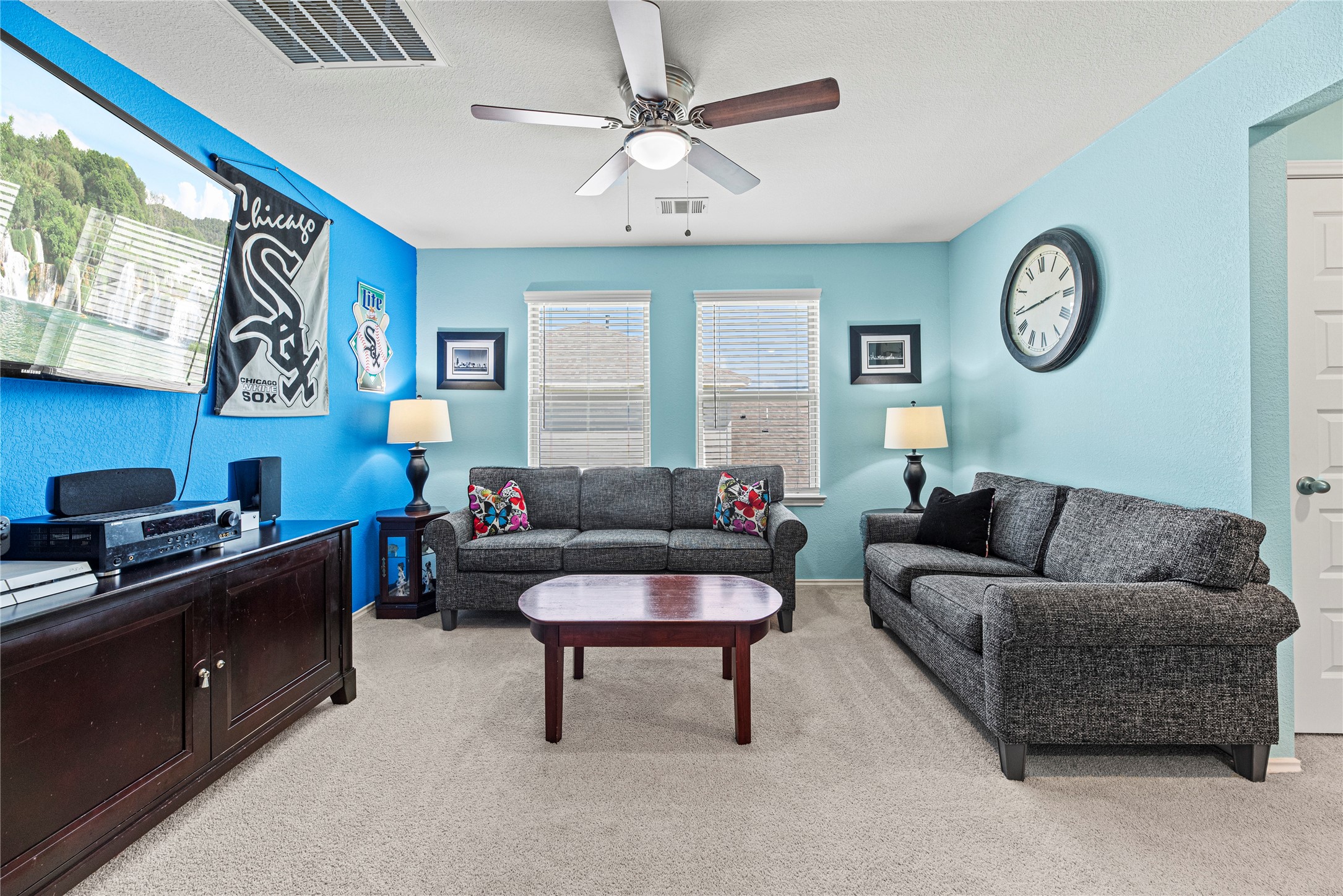 32963 Ruthie Dean Drive Fulshear, TX 77423 - Photo 27 of 45 a living room with furniture and a large window