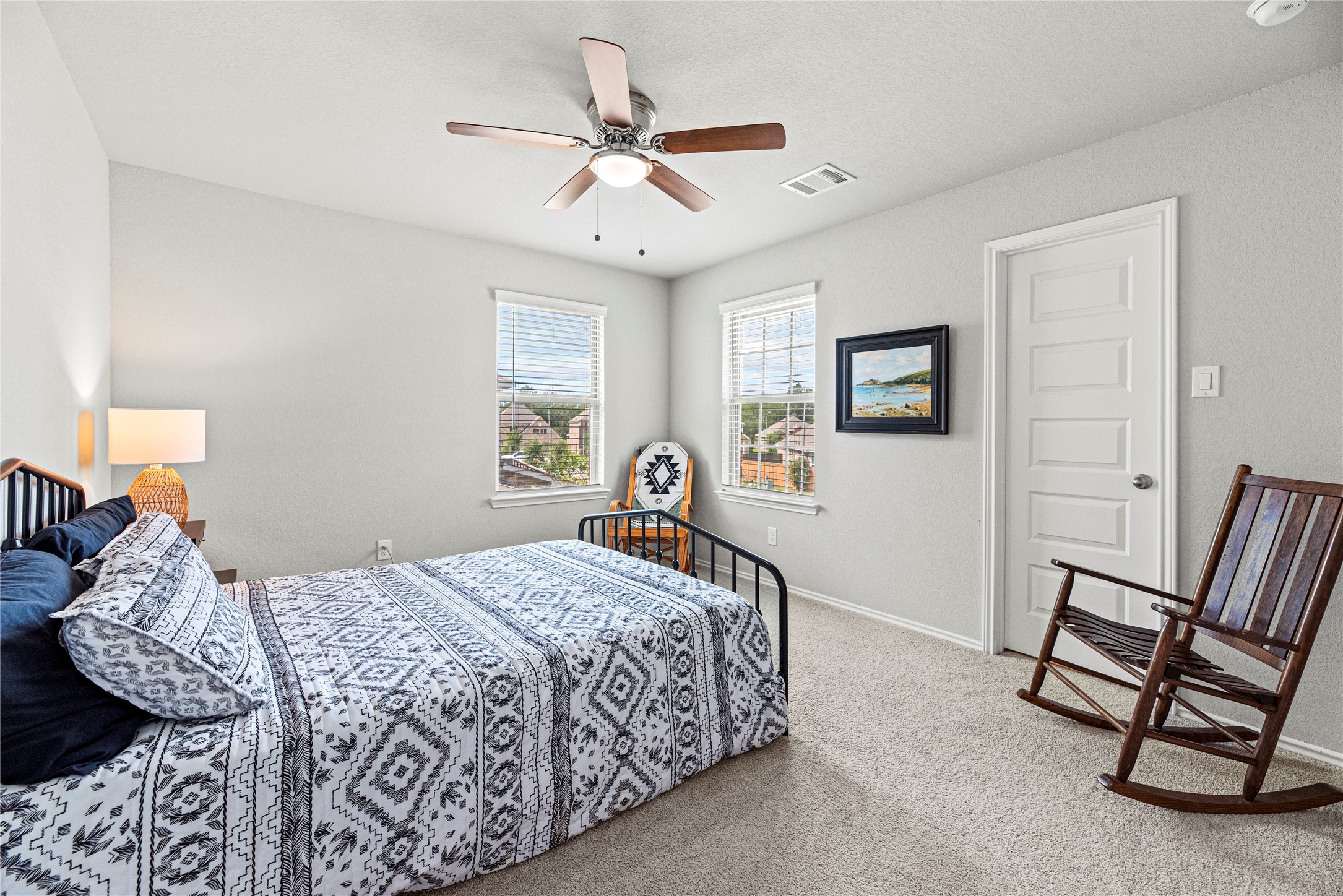 32963 Ruthie Dean Drive Fulshear, TX 77423 - Photo 29 of 45 a bed room with a bed and a window