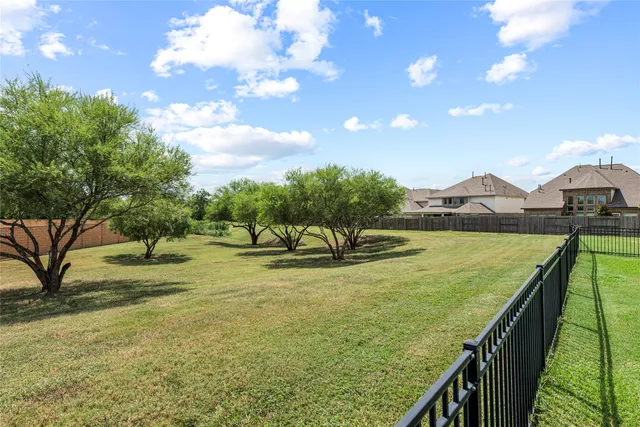 a view of swimming pool from a balcony