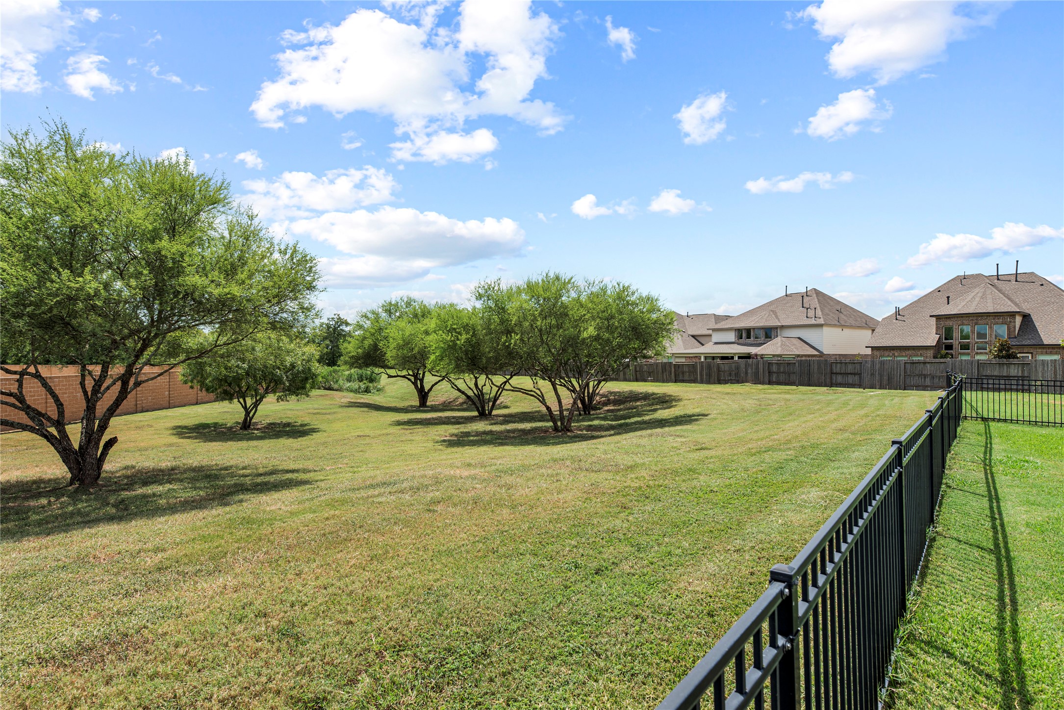 32963 Ruthie Dean Drive Fulshear, TX 77423 - Photo 38 of 45 a view of swimming pool from a balcony