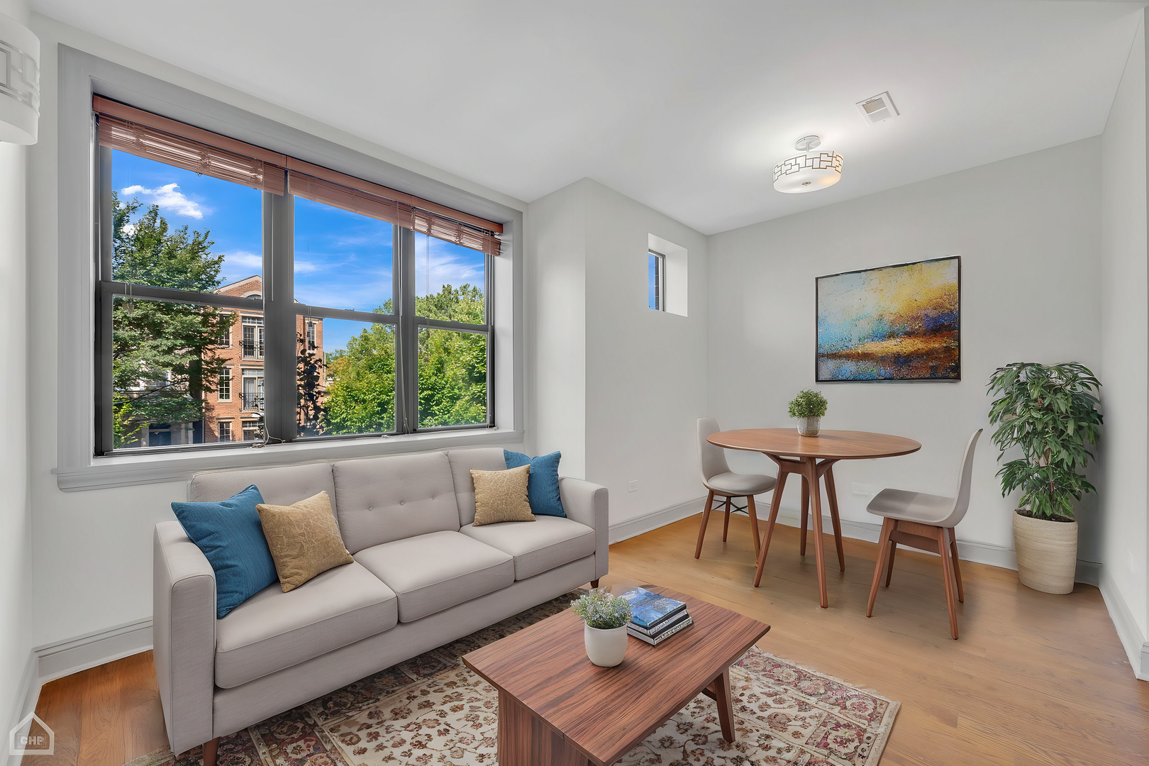 4235 South Calumet Avenue Chicago, IL 60653 - Photo 28 of 47 a living room with furniture and a large window