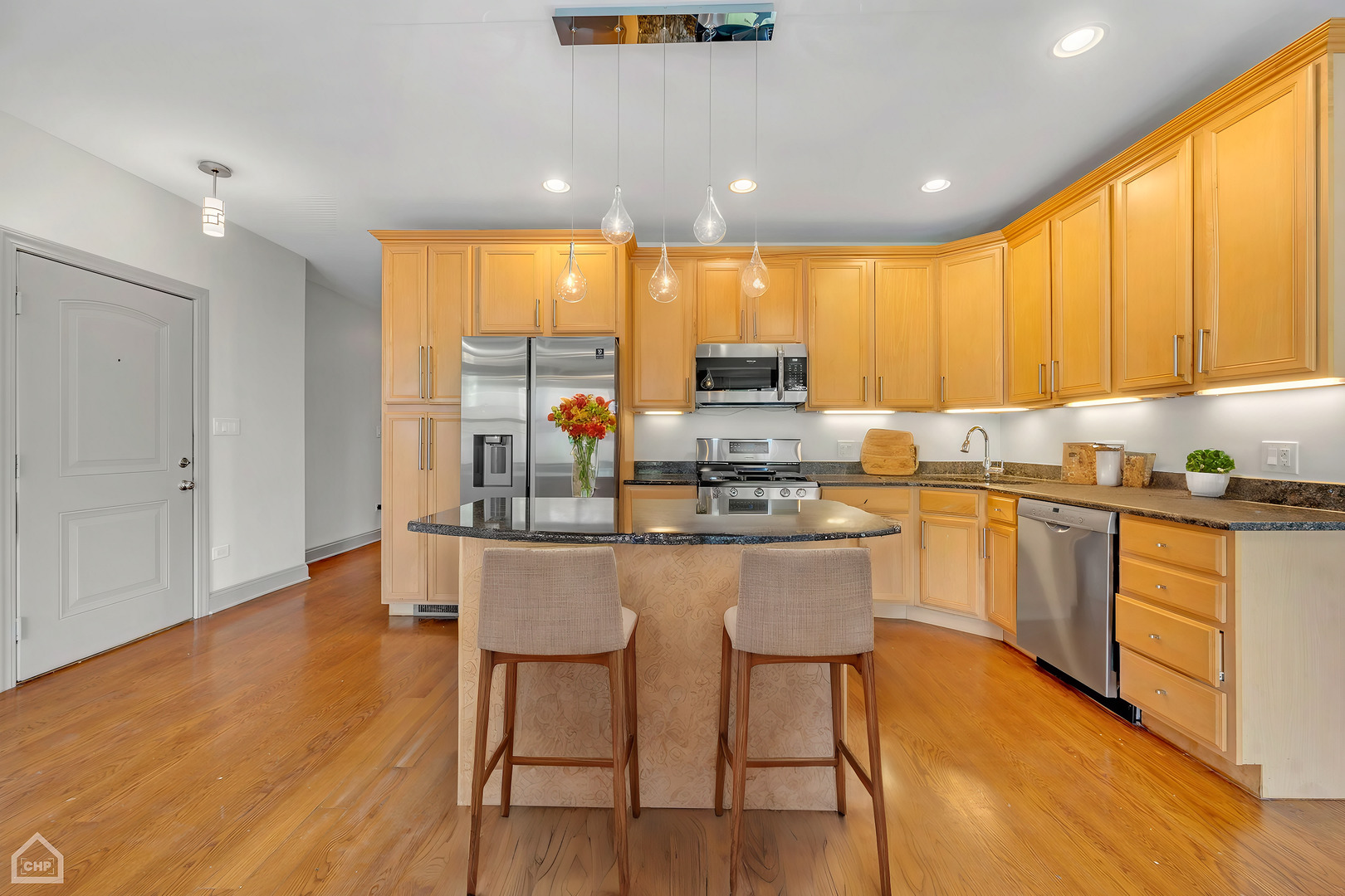 4235 South Calumet Avenue Chicago, IL 60653 - Photo 30 of 47 a kitchen with a sink a counter top space and appliances