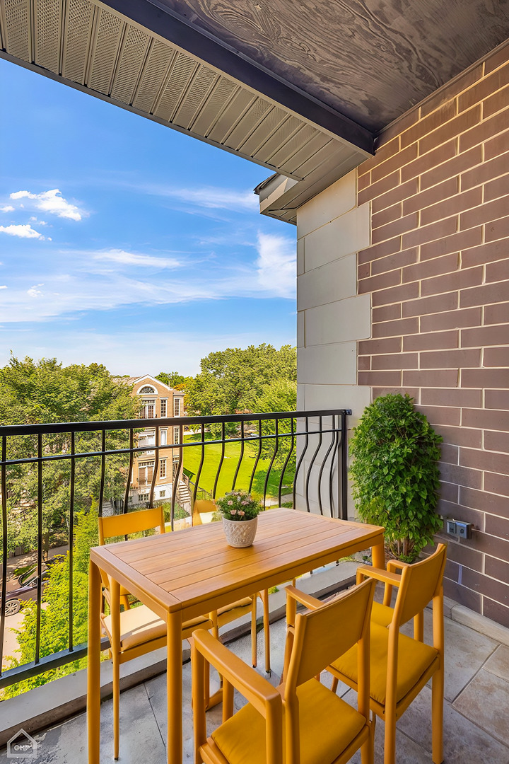 4235 South Calumet Avenue Chicago, IL 60653 - Photo 44 of 47 a view of a balcony with chairs