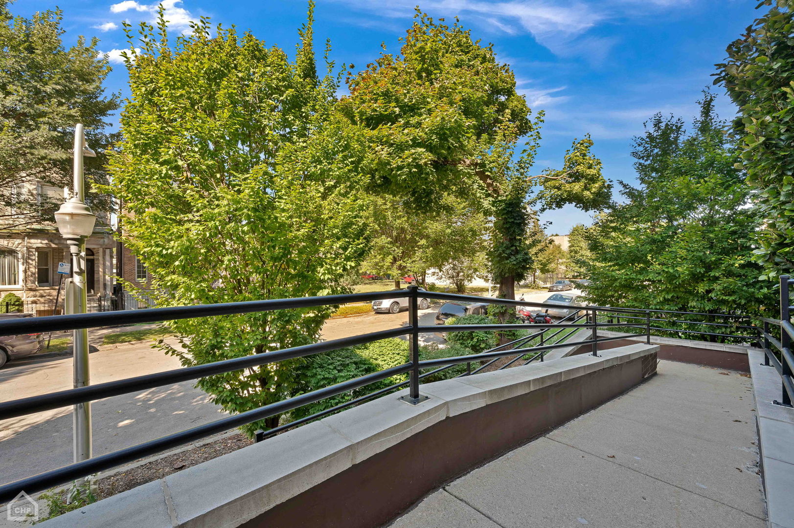4235 South Calumet Avenue Chicago, IL 60653 - Photo 6 of 47 a view of a balcony with mountain view