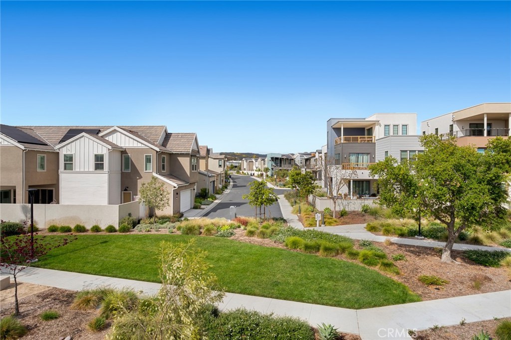 113 Bosal Irvine, CA 92618 - Photo 23 of 63 front view of house with a yard