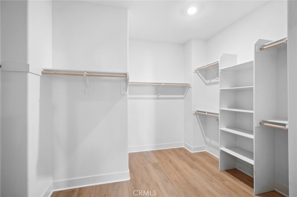113 Bosal Irvine, CA 92618 - Photo 25 of 63 a view of walk in closet with empty racks