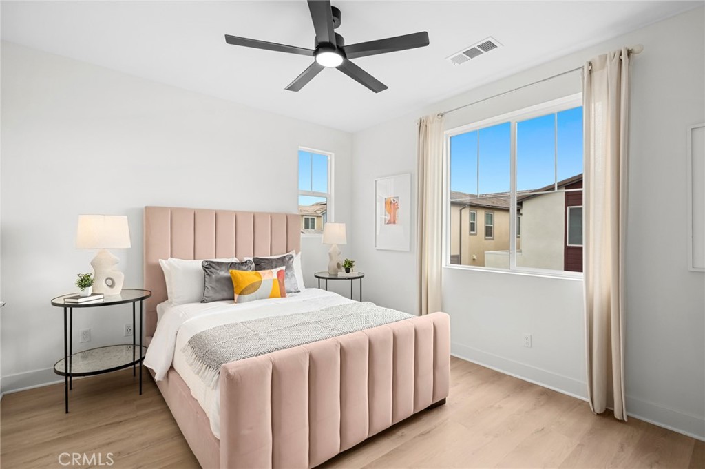 113 Bosal Irvine, CA 92618 - Photo 27 of 63 a bedroom with a bed and window